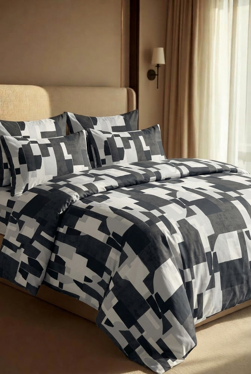 Charcoal Fragments duvet set with taupe pillow covers, close-up view